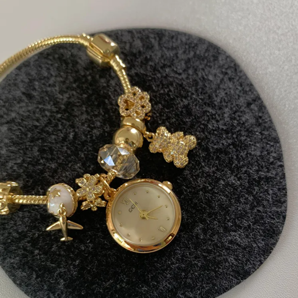 1_216f703a-9731-416a-ab95-2f452c5a852c.png Elegant Zirconia Gold Watch for Women ?C Jewelry?Inspired Bracelet Style
